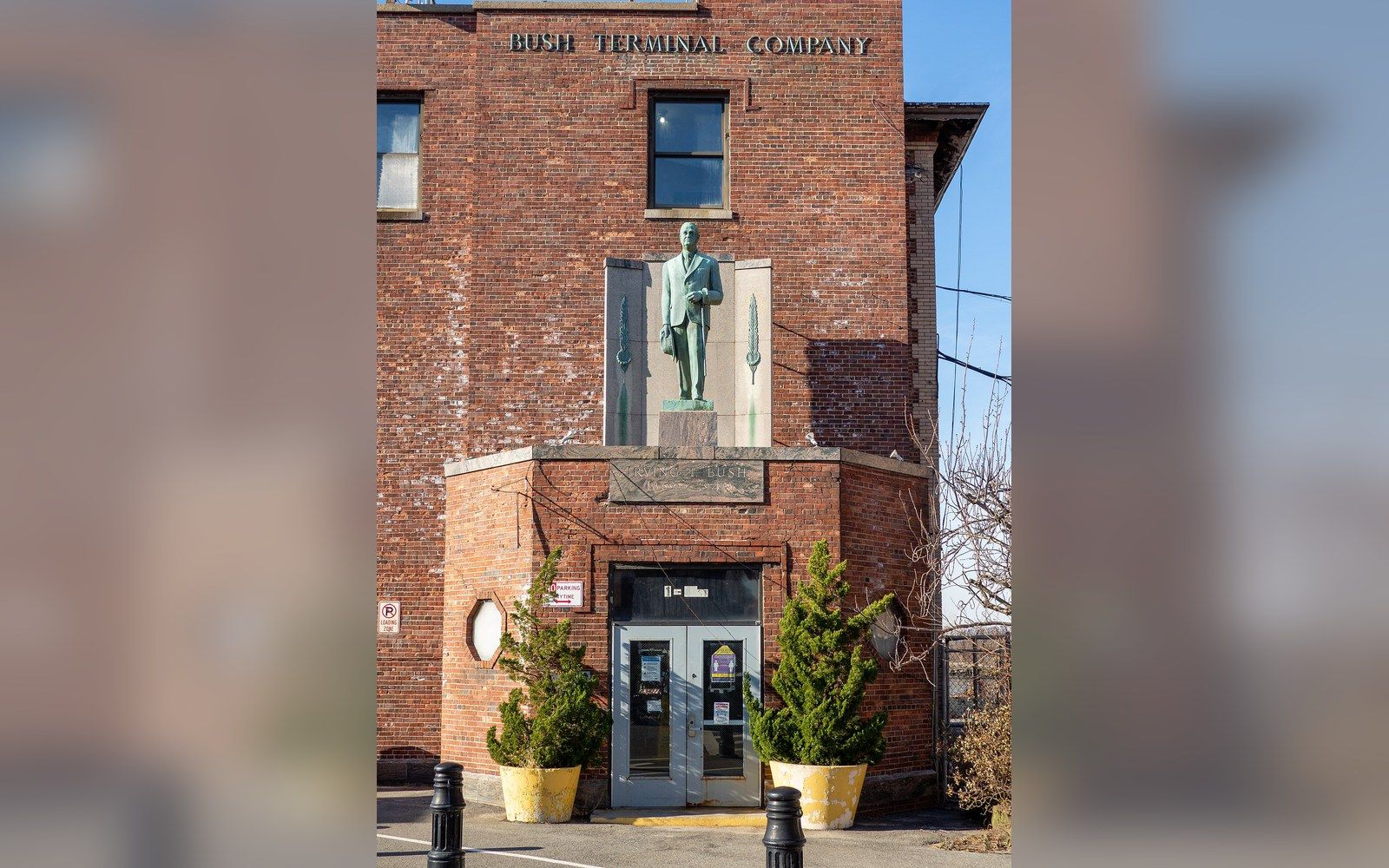 The Bush Terminal Company building with a bronze statue above its doorway